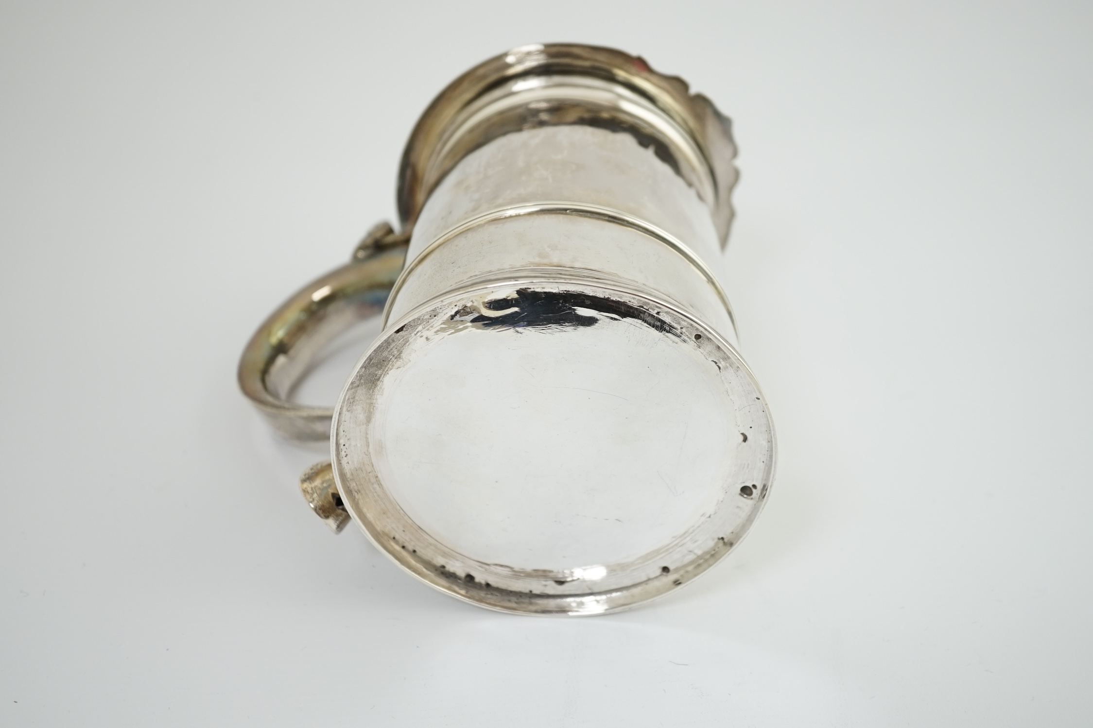 A late Queen Anne Britannia standard silver tankard, maker R?